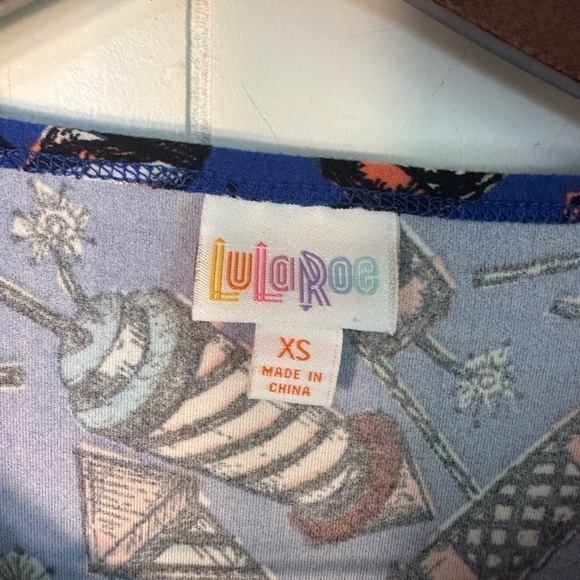 LuLaRoe Women’s Royal Blue Fireworks Irma Top Size XS - Picture 11 of 11